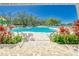 Tranquil view of the community pool from under covered patio at 12783 Maple Bonsai Dr, Riverview, FL 33579