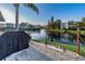 Community outdoor grill overlooking a serene lake at 14130 Rosemary Ln # 4311, Largo, FL 33774