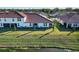 Backyard, screened patio, and water view at 17523 Holly Well Ave, Wimauma, FL 33598