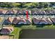 Aerial view of houses and community at 17523 Holly Well Ave, Wimauma, FL 33598