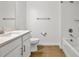 Bathroom with white cabinets and quartz countertop at 17523 Holly Well Ave, Wimauma, FL 33598