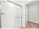 Clean bathroom with walk-in shower and closet access at 17523 Holly Well Ave, Wimauma, FL 33598