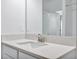 Modern bathroom vanity with quartz countertop and sink at 17523 Holly Well Ave, Wimauma, FL 33598