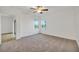 Bright bedroom with carpeting and a water view at 17523 Holly Well Ave, Wimauma, FL 33598