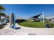 Lagoon Bar with grassy area at 17523 Holly Well Ave, Wimauma, FL 33598