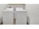 Bright laundry room with washer and dryer at 17523 Holly Well Ave, Wimauma, FL 33598