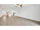 Spacious living room with tile flooring and an open floor plan at 17523 Holly Well Ave, Wimauma, FL 33598