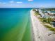 Expansive aerial view of beach, ocean, and coastline at 19915 Gulf Blvd # 805, Indian Shores, FL 33785