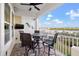 Waterfront balcony with patio furniture and water views at 19915 Gulf Blvd # 805, Indian Shores, FL 33785
