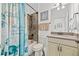 Charming bathroom with tiled shower and updated vanity at 19915 Gulf Blvd # 805, Indian Shores, FL 33785