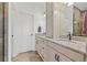 Double vanity bathroom with granite countertops and large shower at 19915 Gulf Blvd # 805, Indian Shores, FL 33785