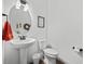 Clean and bright bathroom with pedestal sink and updated fixtures at 19915 Gulf Blvd # 805, Indian Shores, FL 33785