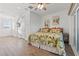 Main bedroom with king-size bed and hardwood floors at 19915 Gulf Blvd # 805, Indian Shores, FL 33785