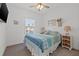 Bright bedroom with a comfortable bed and window at 19915 Gulf Blvd # 805, Indian Shores, FL 33785