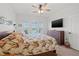 Spacious bedroom with king-size bed and access to a balcony at 19915 Gulf Blvd # 805, Indian Shores, FL 33785