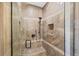Large walk-in shower with tiled walls and built-in seat at 19915 Gulf Blvd # 805, Indian Shores, FL 33785