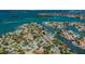 Aerial view showcasing waterfront property near the marina at 249 Boca Ciega Dr, Madeira Beach, FL 33708