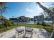 Enjoy waterfront views from your private backyard patio at 249 Boca Ciega Dr, Madeira Beach, FL 33708