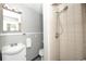 Clean bathroom with shower and updated fixtures at 249 Boca Ciega Dr, Madeira Beach, FL 33708