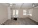 Bright bedroom with wood-look floors and built-in shelving at 249 Boca Ciega Dr, Madeira Beach, FL 33708