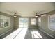 Bright sunroom with sliding doors leading to the patio at 249 Boca Ciega Dr, Madeira Beach, FL 33708