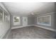 Living room with gray walls and tiled floors at 249 Boca Ciega Dr, Madeira Beach, FL 33708