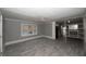 Living room with gray walls and tiled floors at 249 Boca Ciega Dr, Madeira Beach, FL 33708