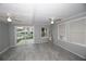 Living room with water view and sliding doors at 249 Boca Ciega Dr, Madeira Beach, FL 33708