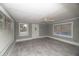Living room with tile floors and neutral walls at 249 Boca Ciega Dr, Madeira Beach, FL 33708