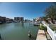 Tranquil waterfront view with boats and marina in background at 249 Boca Ciega Dr, Madeira Beach, FL 33708