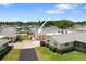 Aerial view of a residential community with several homes and paved driveways at 2740 Highlands Blvd # D, Palm Harbor, FL 34684
