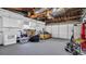 Garage interior with storage, appliances, and white cabinets at 4600 16Th N St, St Petersburg, FL 33703