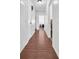 Hallway connecting to other areas of the house with wood floors at 4600 16Th N St, St Petersburg, FL 33703