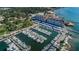 Aerial view of waterfront community with marina and resort-style amenities at 634 Edgewater Dr # 447, Dunedin, FL 34698