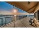 Relaxing balcony overlooking the water with benches at 634 Edgewater Dr # 447, Dunedin, FL 34698
