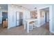 Modern kitchen with white cabinets and stainless steel appliances at 634 Edgewater Dr # 447, Dunedin, FL 34698