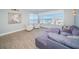 Living Room with water view and comfy seating at 634 Edgewater Dr # 447, Dunedin, FL 34698