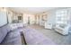 Spacious living room with comfy seating and hardwood floors at 634 Edgewater Dr # 447, Dunedin, FL 34698
