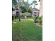 Landscaped courtyard with lush greenery at 7519 Pitch Pine Cir # 171, Tampa, FL 33617