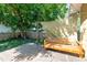 Wooden deck with a bench and string lights at 809 E Lambright St, Tampa, FL 33604