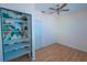 Charming bedroom with built-in shelving and light walls at 809 E Lambright St, Tampa, FL 33604
