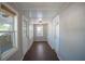 Bright sunroom with hardwood floors and multiple windows at 809 E Lambright St, Tampa, FL 33604