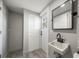 Small bathroom with pedestal sink and a white vanity at 8390 64Th N St, Pinellas Park, FL 33781