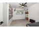 Spacious bedroom with hardwood floors and musical instrument storage at 8390 64Th N St, Pinellas Park, FL 33781