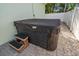 Relax in this covered hot tub with steps, perfect for outdoor enjoyment at 8390 64Th N St, Pinellas Park, FL 33781