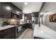 Modern kitchen with stainless steel appliances and marble countertops at 8390 64Th N St, Pinellas Park, FL 33781