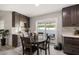 Kitchen breakfast nook with round table and four chairs at 8390 64Th N St, Pinellas Park, FL 33781