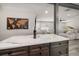 Modern kitchen with dark cabinetry and quartz countertops at 8390 64Th N St, Pinellas Park, FL 33781