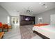 Spacious main bedroom with large built-in entertainment center and private access to balcony at 8390 64Th N St, Pinellas Park, FL 33781