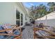 Inviting patio with comfortable seating and brick pavers at 8390 64Th N St, Pinellas Park, FL 33781